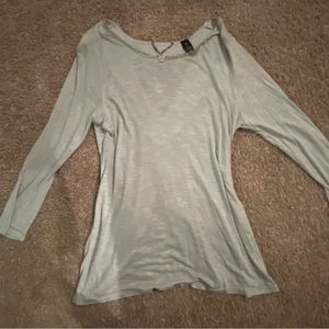 Nwot BKE teal embellished blouse w open back and sheer peephole .